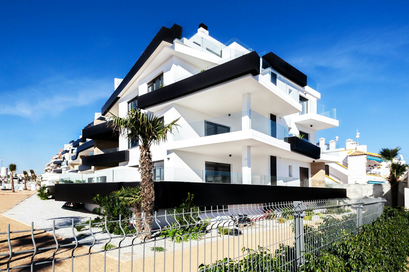 houses surrounded with plants high-value home